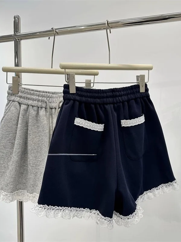 Plones cortos de pierna ancha de estilo coreano con encaje y retazos para mujer, falda con cordón de cintura elástica ade...