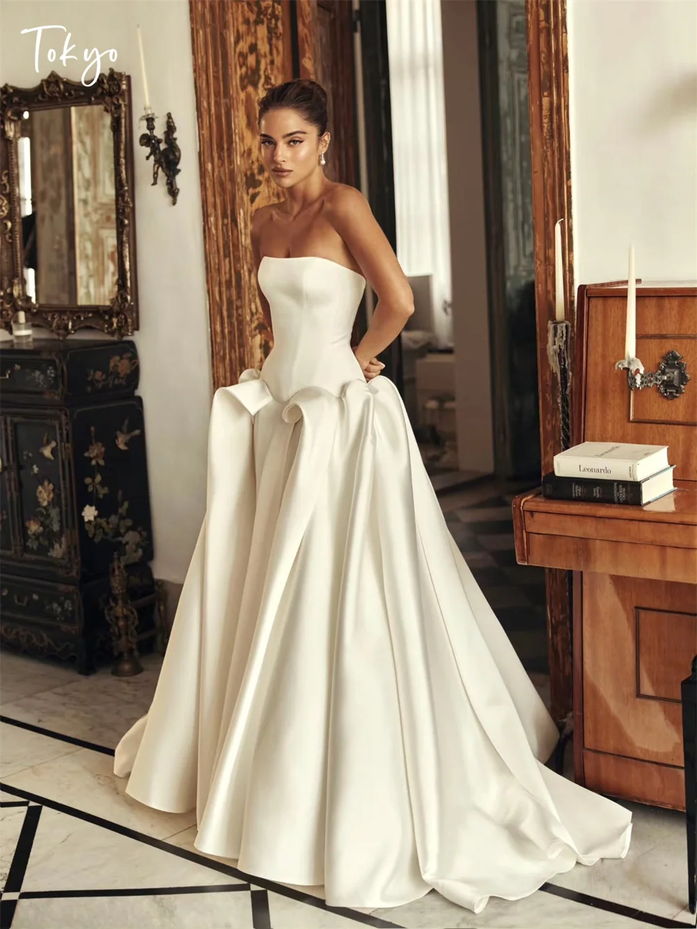 طوكيو مخصص فساتين زفاف أنيقة من الساتان بدون حمالات بدون أكمام من الخلف برباط علوي زي العرائس 2025 فساتين زفاف بيضاء على شكل حرف a #1