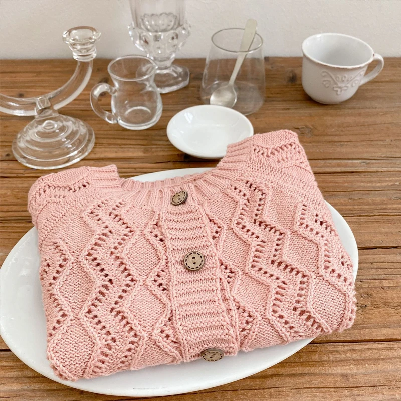 New autumn baby clothing, 0-3 year old baby girl solid color sweater versatile cardigan hollowed out knitted long sleeved jacket