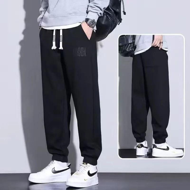 2023 Autumn Men\'s Solid Color Printed Elastic Waist Guard Pants for Men\'s Winter Thickened and Versatile Foot Tie Guard Pants