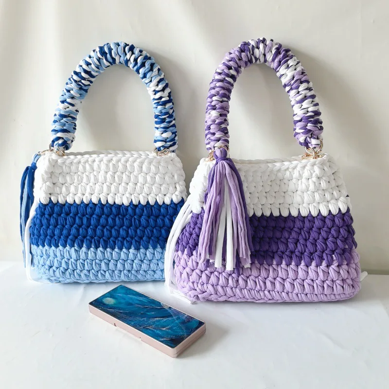 The latest Hyunya cloth strips contrast colors, hand-stitched tassel, large-capacity handbag