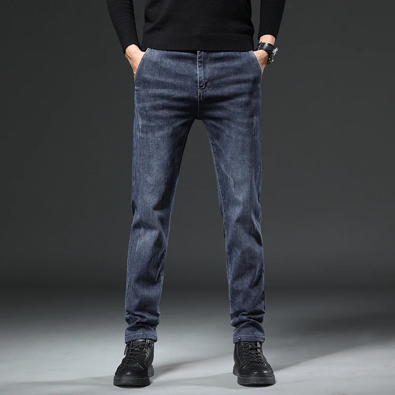 秋と冬の新作伸縮性のあるルーズフィットペンシルパンツファッションブランドデニムメンズジーンズカジュアルハーランパンツ