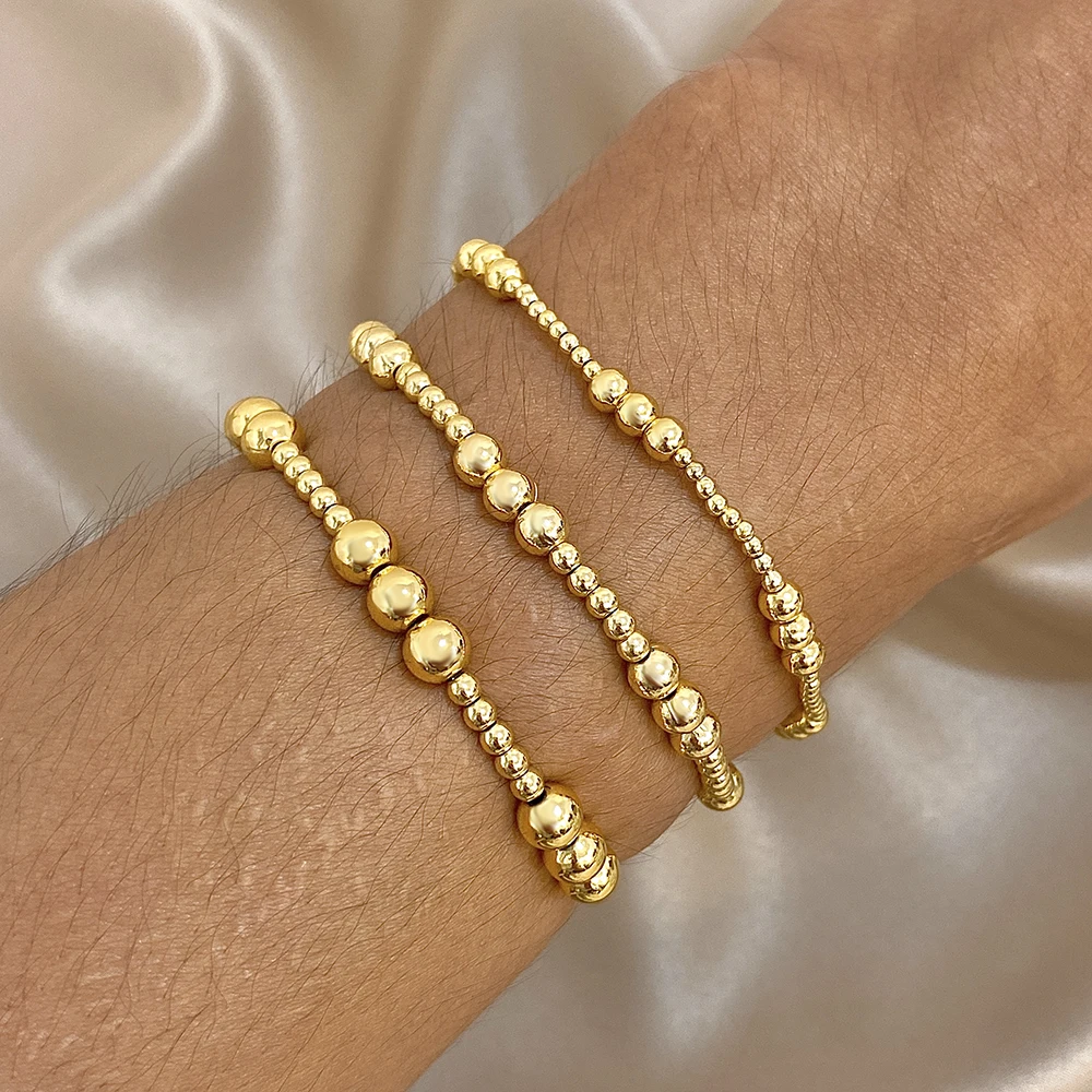 Brazalete ajustable elástico con cuentas de acero inoxidable de Color dorado, brazalete Vintage para mujer, dijes impermeables, regalos de joyería