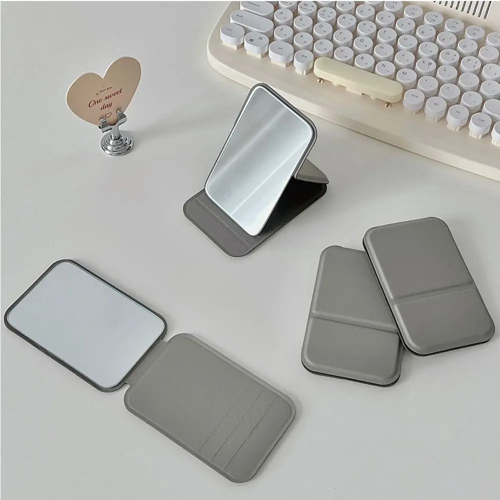 Espelho de maquiagem de mesa cor sólida couro do plutônio simples portátil espelho de maquiagem dobrável estudante compacto bonito espelho de bolso