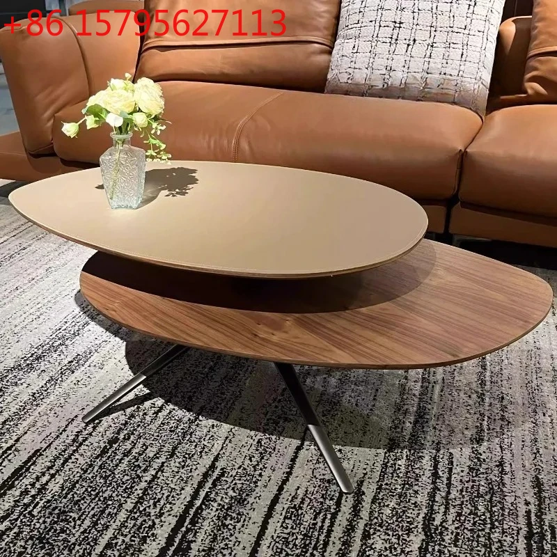 

Saddle leather high-end rotating coffee table living room home art Italian minimalist special-shaped new model