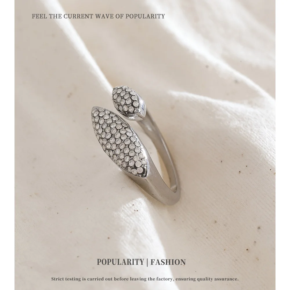 NiNice خاتم الفولاذ المقاوم للصدأ برأسين الزركون شخصية نمط تصميم الأزياء والمجوهرات هدية بالجملة