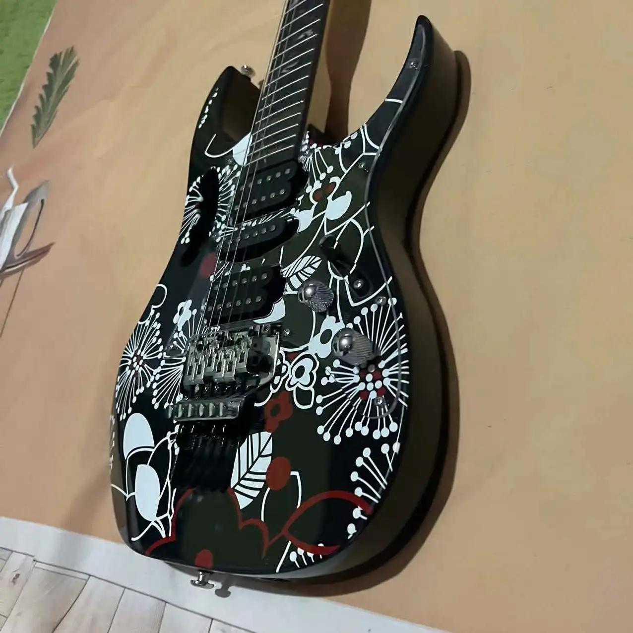 In stock, 6-chord shaped electric guitar with black cherry blossom pattern body and chrome plated hardware accessories. Real pic