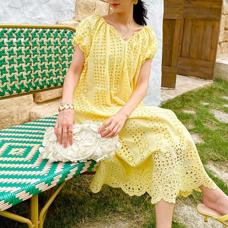 فستان الربيع والصيف للنساء تي شيرت على شاطئ البحر ينفق فساتين الشاطئ للعطلات بضائع أوروبية فضفاضة ومريحة