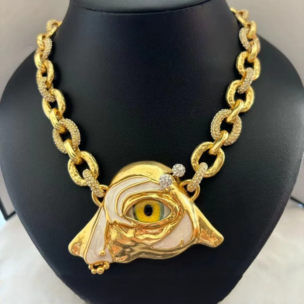 

Designed by a Gifted Designer: Exaggerated Gaze Half-Face Mask Pendant Necklace, Enamel Craftsmanship, Heavy-Duty Brass – Ideal