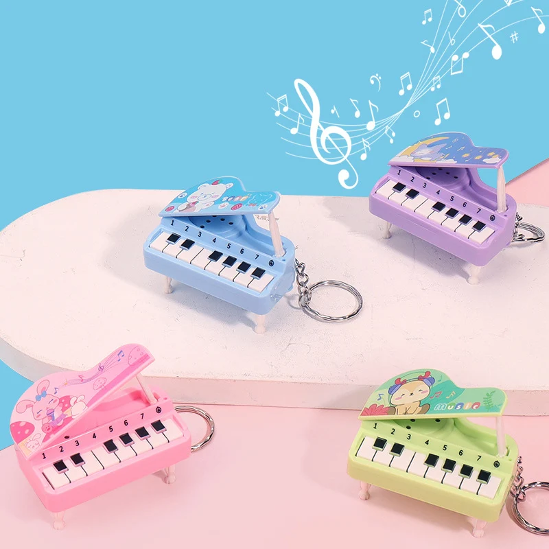 Criativo dos desenhos animados música piano eletrônico chaveiros engraçado brinquedos de som mini instrumento musical piano pingente chaveiro presente aniversário