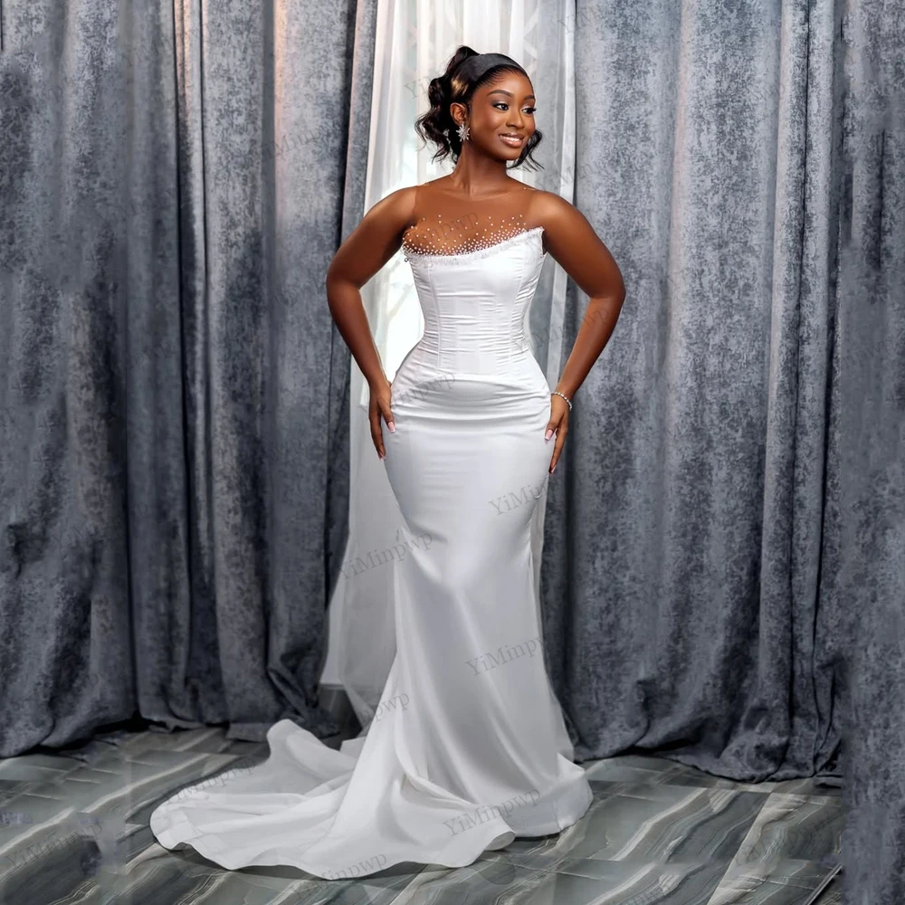 

Customized Beaded Sleeveless Wedding Dresses Bridal 2026 Satin Mermaid O-Neck Pearls Bride Gowns For African Women Sweep Train