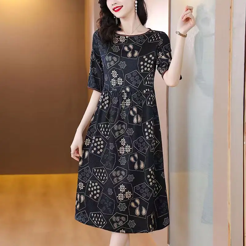 

2024 Summer New Women's Simplicity Crew Neck Spliced Printed Elegant Loose Appear Thin Commuter Short Sleeve Large Hem Dress