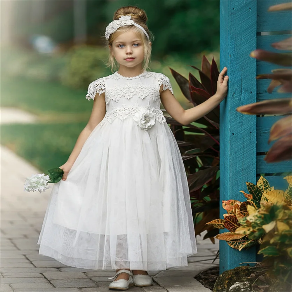 

New Arrival Round Neckline Short Cap Sleeves Tulle Flower Girl Dress Elegant Keyhole Back Floor Length First Communion Ball Gown