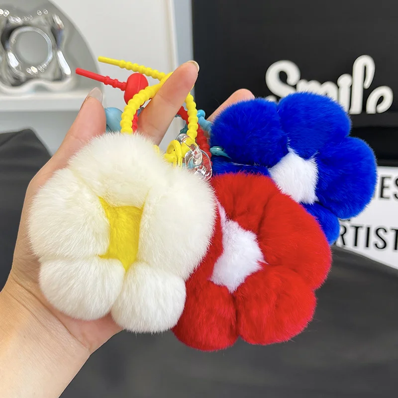 

Новый стиль: Модный брелок-подвеска из натурального меха норки с маленьким цветком для сумки, кошелька, ключей от машины. Подарки.