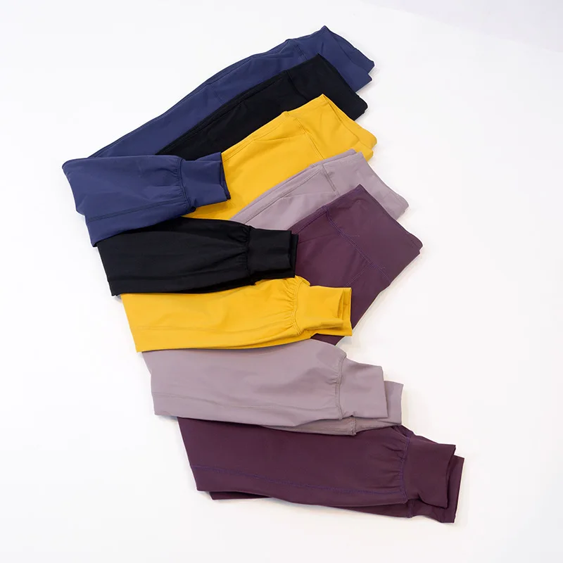 بنطلون يوغا طويل مرن عالي الخصر للنساء مع جيوب خارجية وأصفاد مريحة للكاحل وخصر مرن لصالة الألعاب الرياضية واليوجا