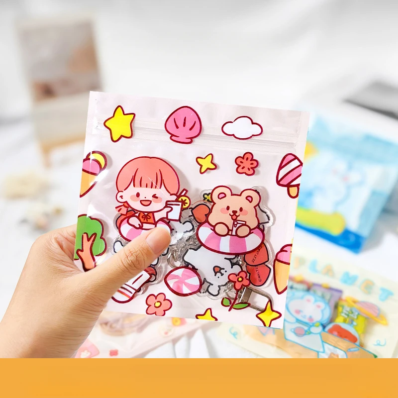 100 الكرتون لطيف رائعتين اكسسوارات مشبك شعر التعبئة والتغليف حقيبة تخزين المجوهرات كابل بيانات حقيبة عزل العناصر الصغيرة الذاتي حقيبة عزل