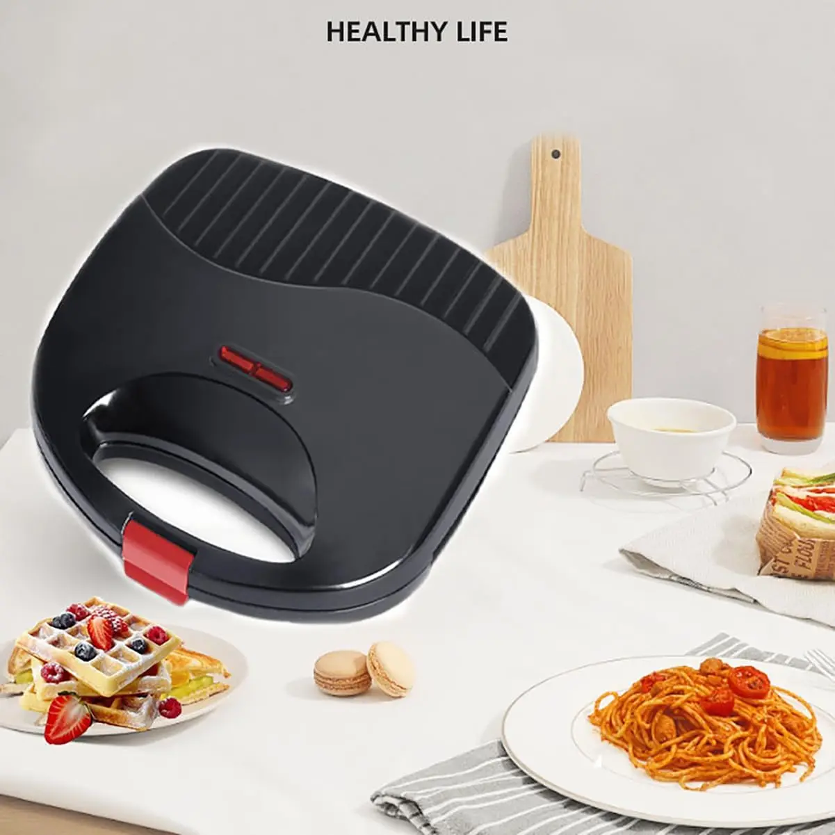 ماكينة صنع الوافل المنزلية، ماكينة صنع الساندوتشات، ماكينة صنع الإفطار، ماكينة شواء اللحوم، ومقلاة الكيك، والساندويتش