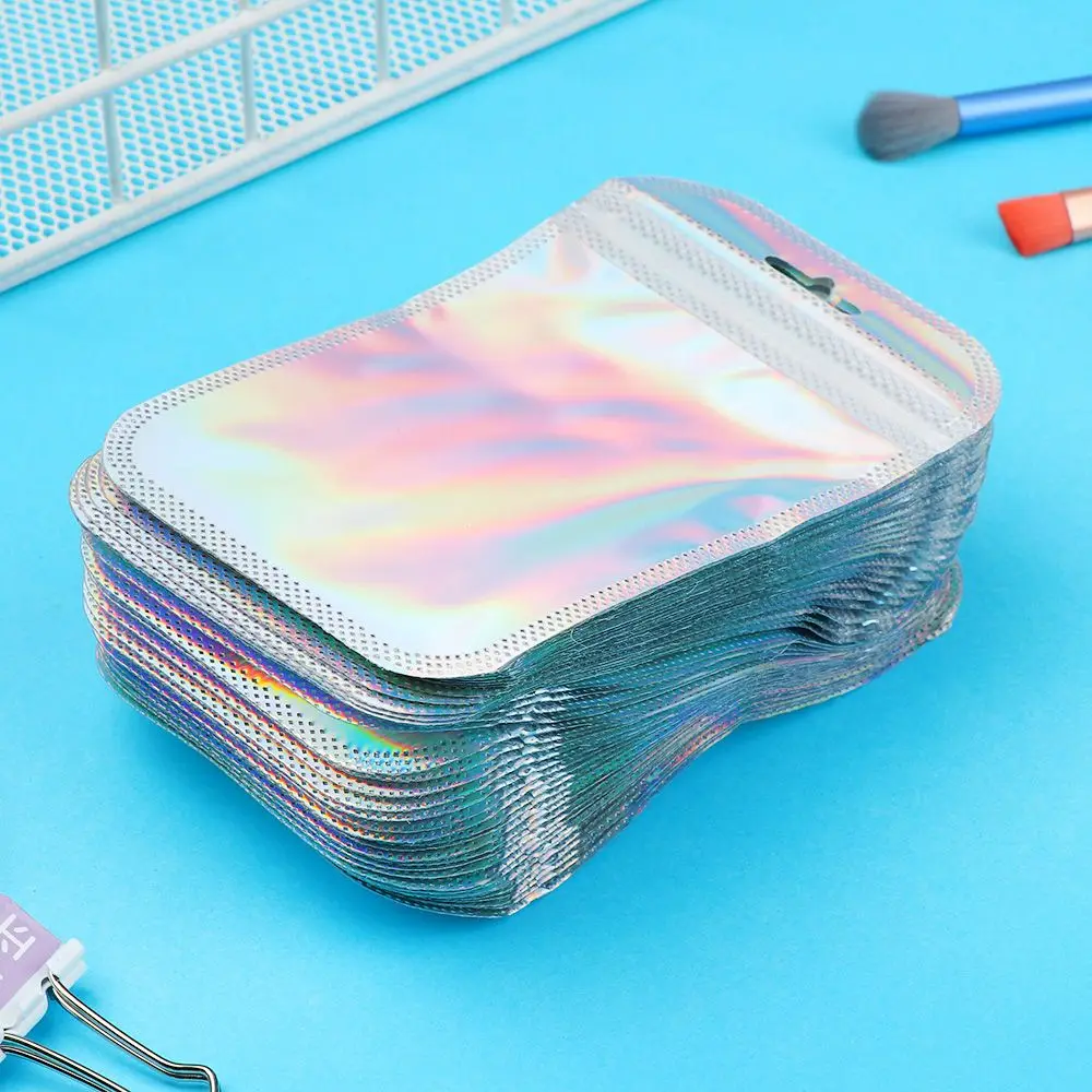 50pcs Laser Packaging Bags Resealable OPP Bags Cosmetic Bag One Side Clear Holographic Mini Aluminum Foil Zip Lock Bags Thick