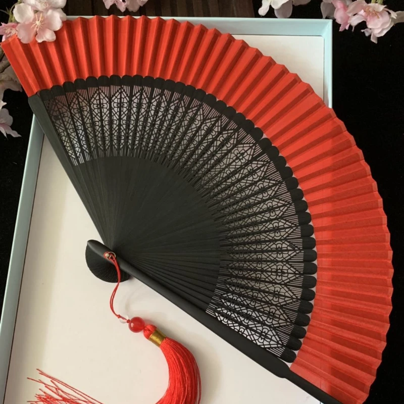 

Chinese style carved ancient style bright red summer folding fan folding fan red black silk solid color dance fan hollowed out