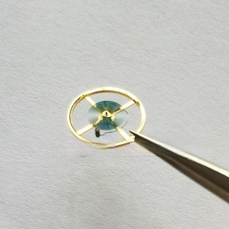 

Детали подходят для аксессуаров часового механизма, верхнего балансового колеса механизма 3135, синего балансового колеса пружины, включая