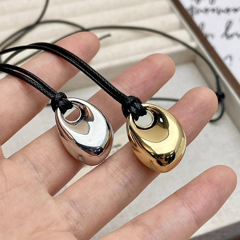 

Trendy Metal Bean Long Sweater Pendant Necklaces for Women Black PU Leather Rope Chain Necklaces Jewelry Adjustable Accessories