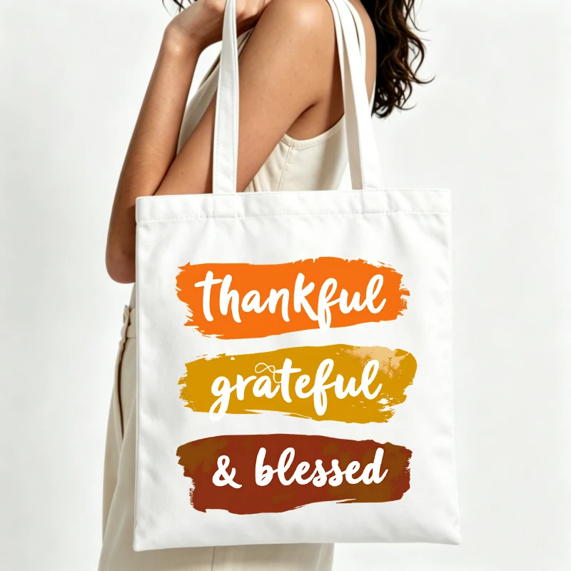 Women's handwritten text canvas tote bag with thankful graphic, perfect for casual daily use and autumn outings