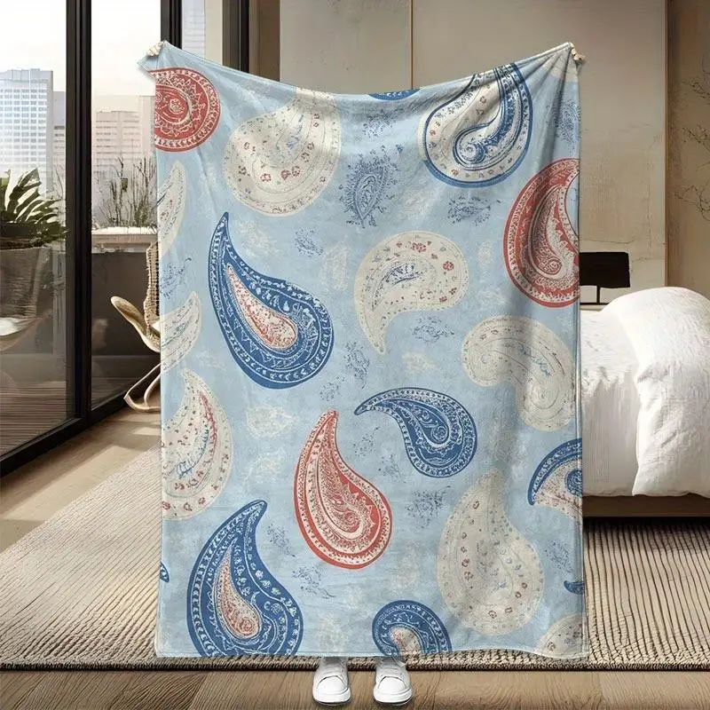 Paisley pattern blanket, polyester fabric, machine washable, suitable for use on sofas, beds or outdoors.