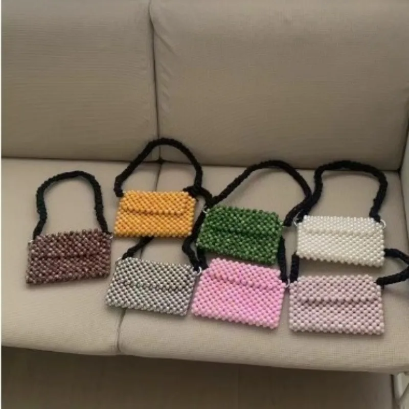 

2024 New Handwoven Summer Fashion Women's Shoulder Bag Finished Multi Color Horizontal Simple Handheld Vintage Postman Bags