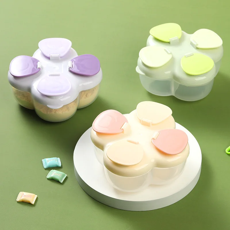 

Baby snack storage box, portable for on-the-go food, with spoon and divided compartments, suitable for travel and picnics