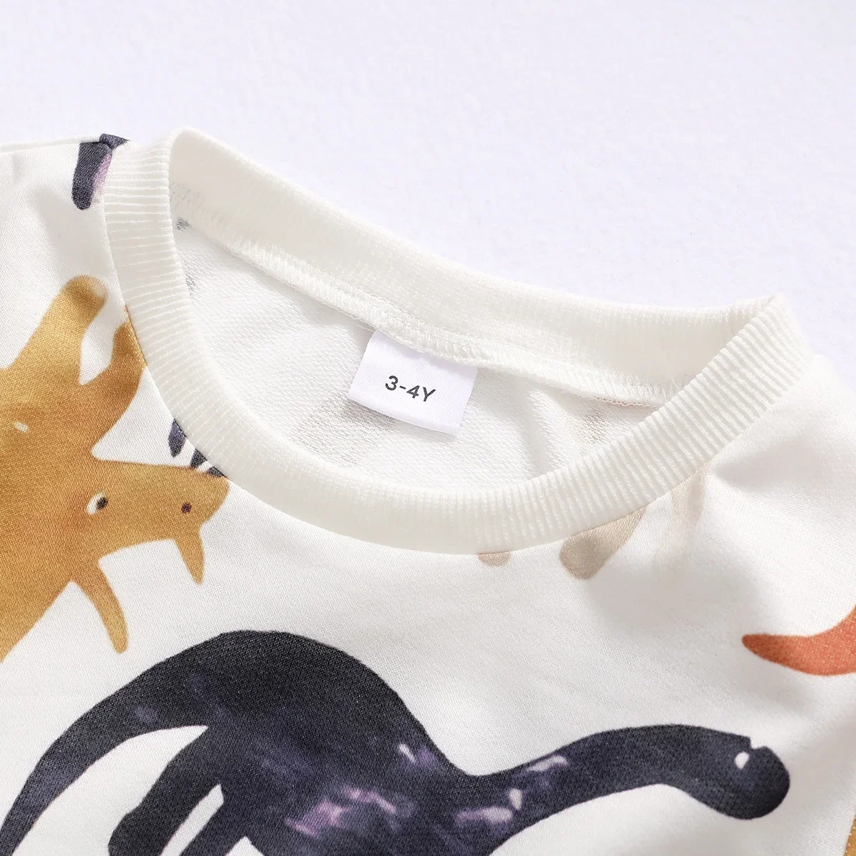 PatPat Baby Boy All Over Cartoon Dinosaur Print Long-sleeve Pullover Sweatshirt Perfect for Outings and Daily Wear Basic Style