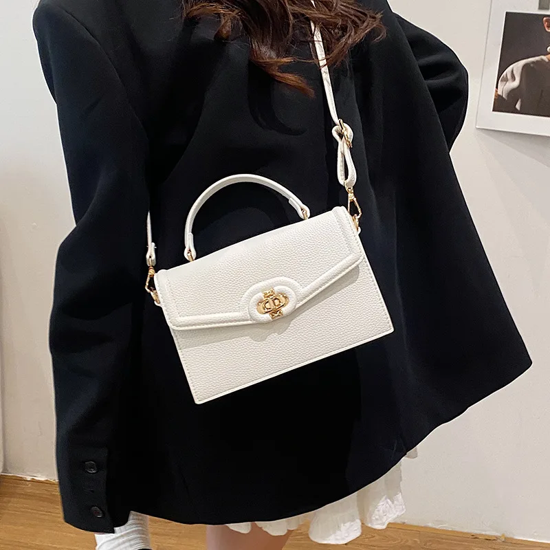 กระเป๋าสะพายข้าง กระเป๋าถือ แฟชั่นใหม่ สไตล์ยุโรปและอเมริกา ย้อนยุค เหมาะสำหรับการเดินทางอเนกประสงค์ สะพายไหล่เดียว ทรงสี่เหลี่ยมเล็ก กระเป๋าผู้หญิง