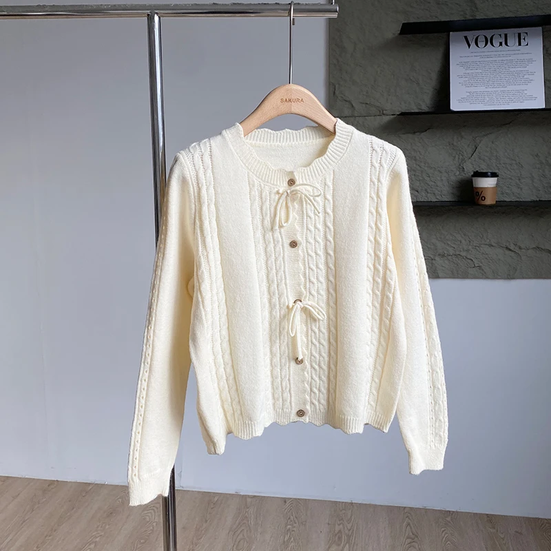 Cárdigan de punto coreano con agradable arco para mujer, suéter suave de manga larga de Color sólido a la moda, Tops informales sueltos suaves de otoño 2025