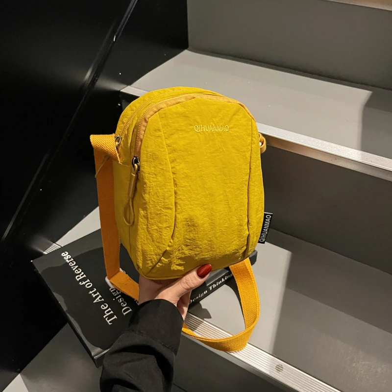 

2025 New Trendy Sporty Casual Phone Bag, Stylish and Versatile Canvas Bag, Portable Commuting Small Bag for Women, Suitable for