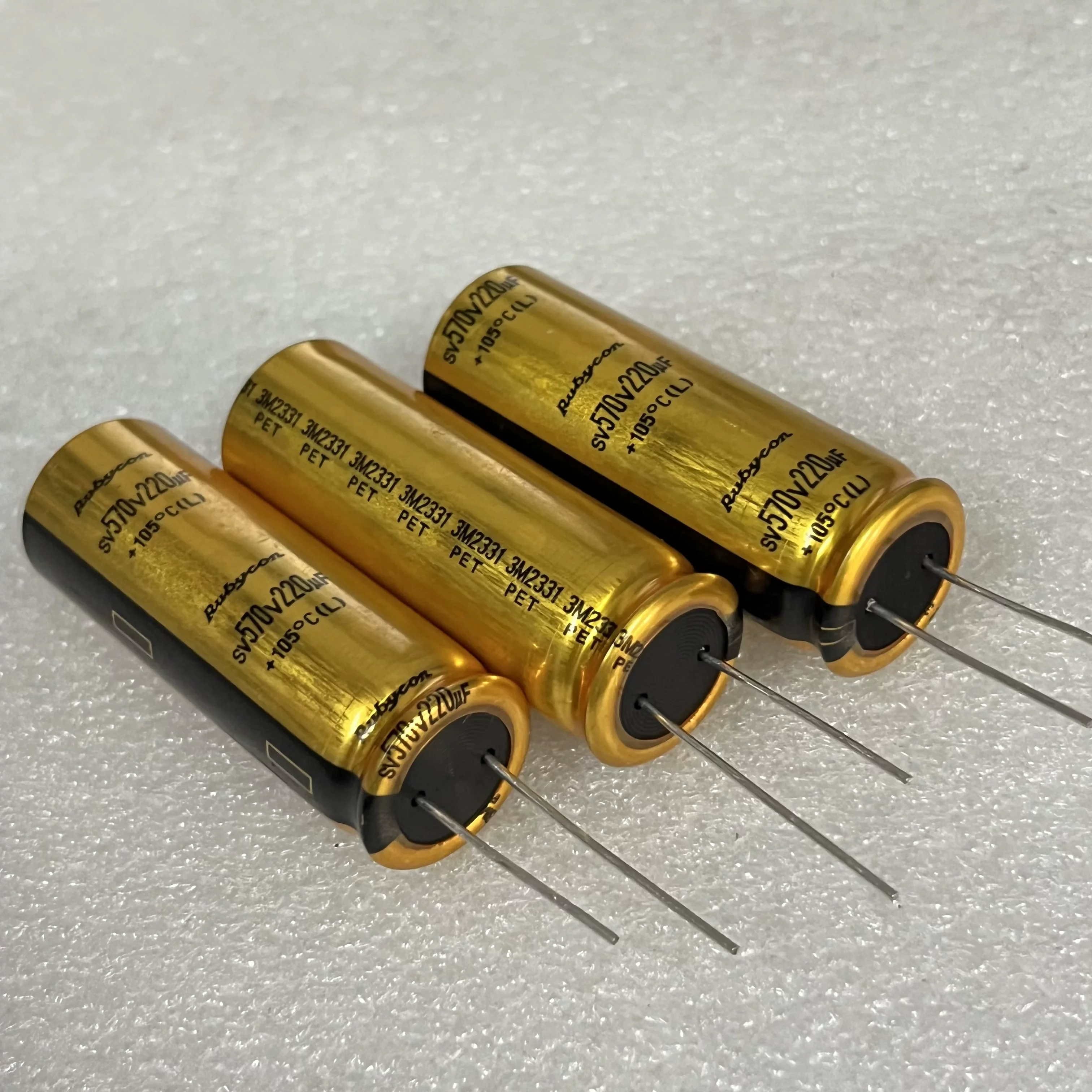 2PCS/LOT Original Fever Amplifier Gold Shell Capacitor 570V 220UF 18X50MM Replacement 450V 220UF
