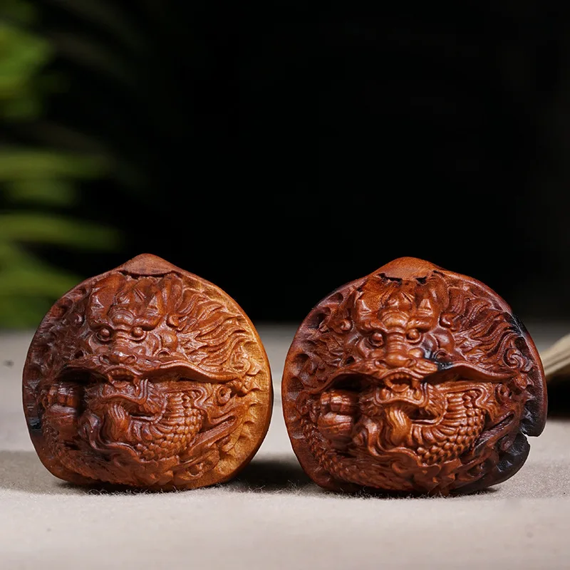 walnut handball made from lightning-struck jujube wood, a health care item with dragon patterns, a hand-carved woo