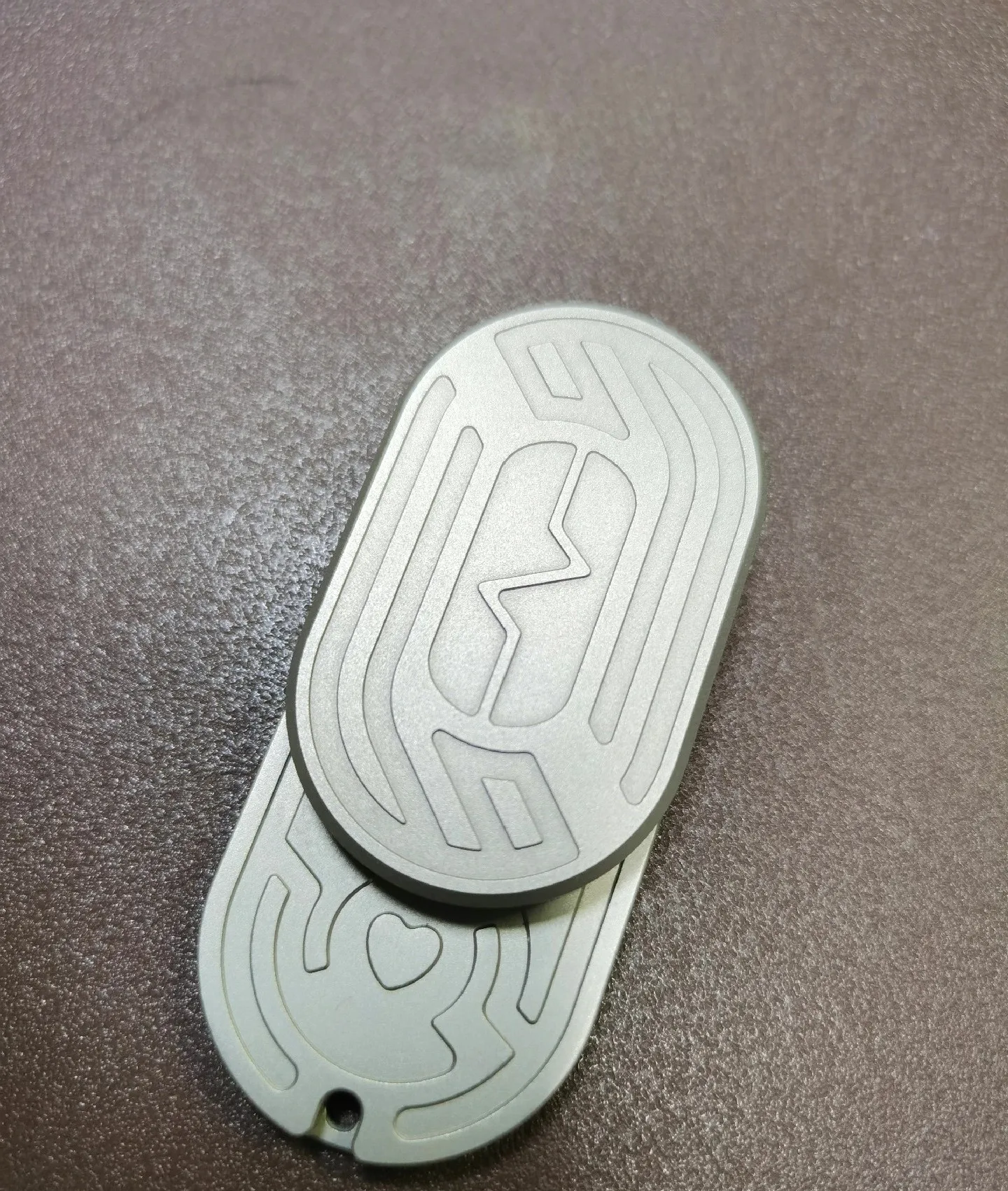 Used EDC Mot Rhythm, Stainless Steel Primary Color Sandblasting, No Bumping, Normal Play, Very Good Feel