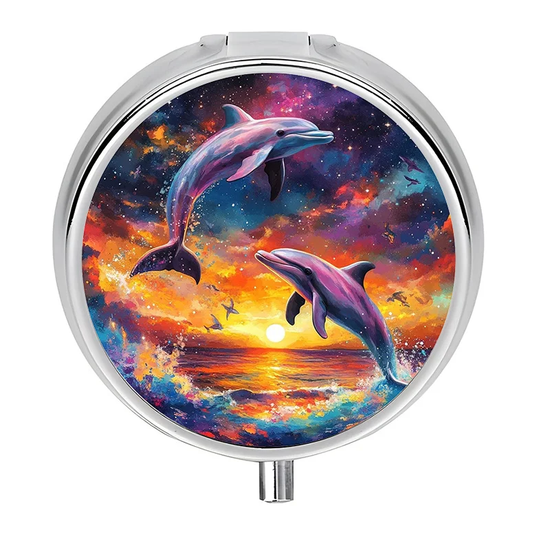 A portable travel pill box with 3 compartments, featuring a galaxy scene and dolphin pattern, can be placed in a purse or handbag, making it a unique gift for Halloween or Christmas