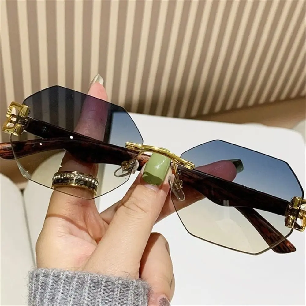 

Fashion Steampunk Rimless Sunglasses Metal Luxury Leopard Head Sun Glasses Vintage Irregular Shades for Women Men