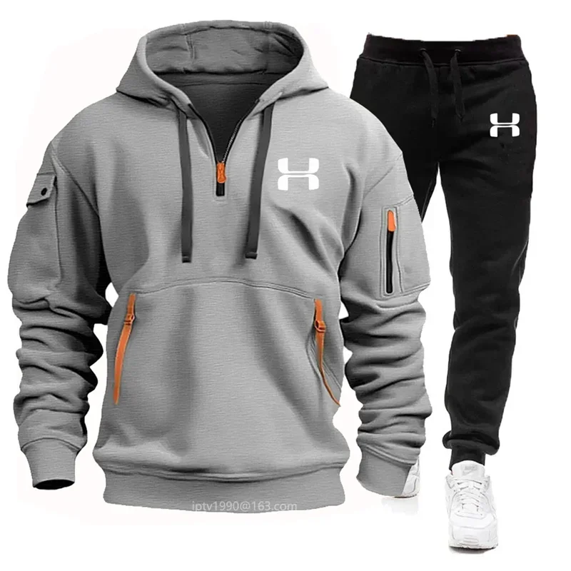 

A Two-piece Fitness Jogging Set Featuring a Multi-pocket Zippered Long-sleeved Sweatshirt and Sporty Casual Pants for Men's Autu