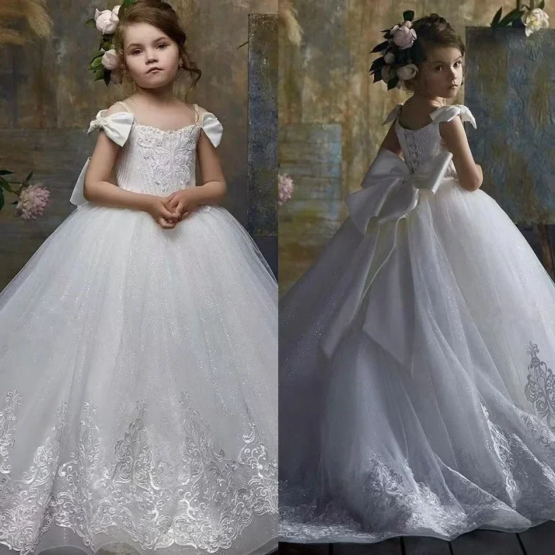 Blumenmädchenkleider für die Hochzeit 2025, bauschiges Tüll-Ballkleid mit Schleifen, Prinzessin-Erstkommunion-Kleider, weiße Spitzenapplikationen