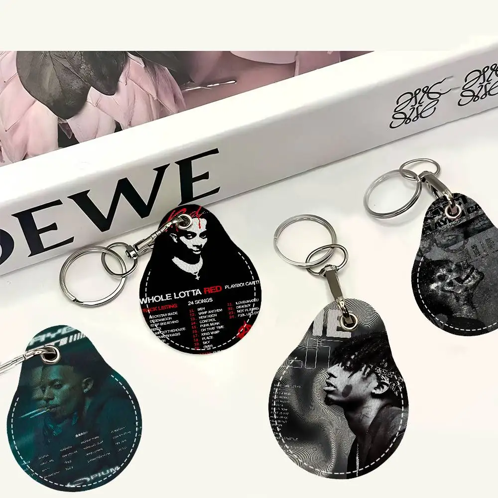 مغني الراب P-Playboi C-CartiS سلاسل المفاتيح المستديرة للنساء بولي Leather الجلود الفراغات حلقات المفاتيح مثالية لهدايا العيد ومفضلات الحفلات