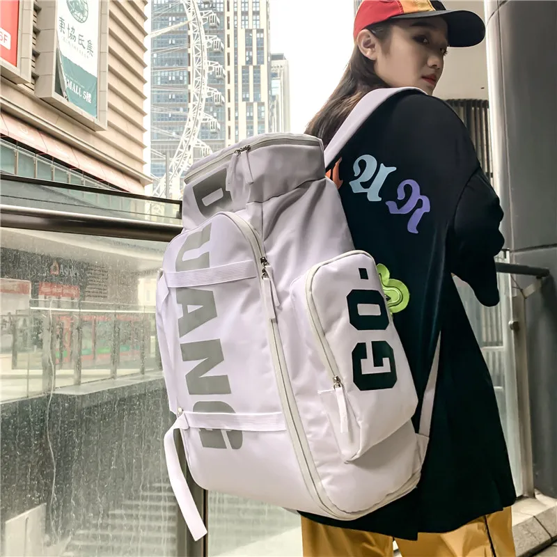 Schoolbag cool large capacity backpack mountaineering travel backpack skateboard veneer men's bag dry wet separation fitness bag