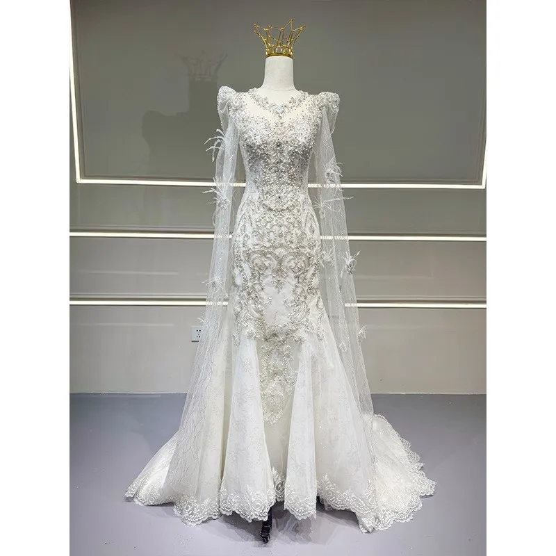 

A new elegant lace fishtail dress with light gauze feel for travel photography and welcoming guests