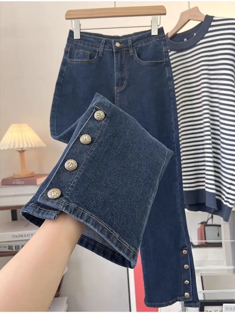 Pantaloni a petto irregolare autunno femminile nuovi jeans di nicchia larghi elastici a vita alta slim fashion design sense di grandi dimensioni.