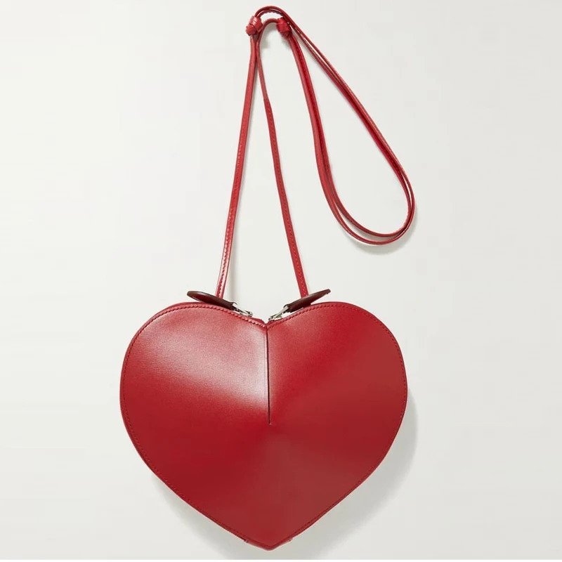 Bolsos de diseñador de lujo con forma de corazón de melocotón para mujer 2023 Nueva moda de alta calidad Monedero Simple Versátil Señora Pequeño Hombro Crossbody Bolsos Envío gratis Llegada rápida