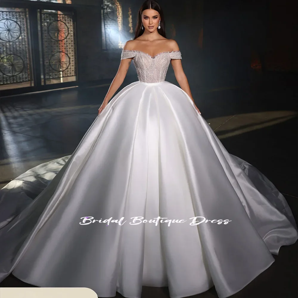 تخصيص أناقة الكتف الساتان دبي فساتين الزفاف Vestido De Noiva ألف خط التألق الدانتيل الخرز فساتين زفاف مثير