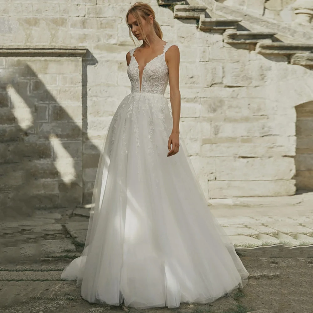

Exquisite Wedding Dresses V Neck Customized Sleeveless Bride Gown With Lace Applique A-Line Court Train فستان حفلات