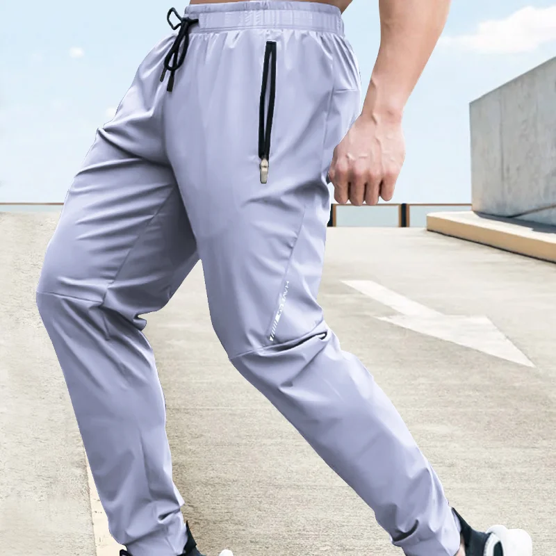 Calças de ginástica masculinas calças de pista verão roupas masculinas marca de moda casual agasalho para homens calças de secagem rápida moletom