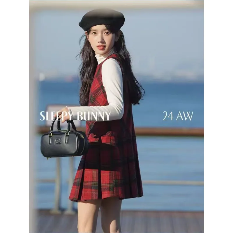 Vestido retrô contrastante xadrez colete para mulheres na primavera e no outono temperamento emendado sem mangas em camadas vestido plissado linha A