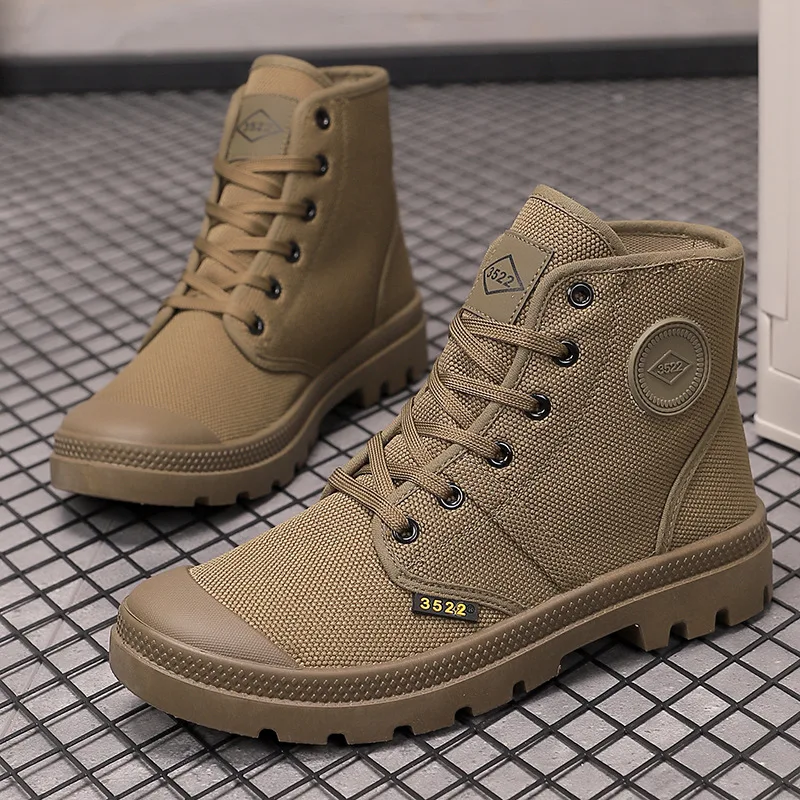 Botas de hombre, botines de lona, botas de goma con cordones Retro, senderismo al aire libre, zapatos altos para hombre, botas de trabajo antideslizantes de alta calidad 2025